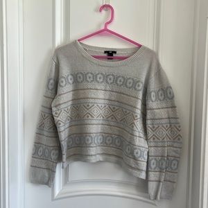 White blue and tan sweater